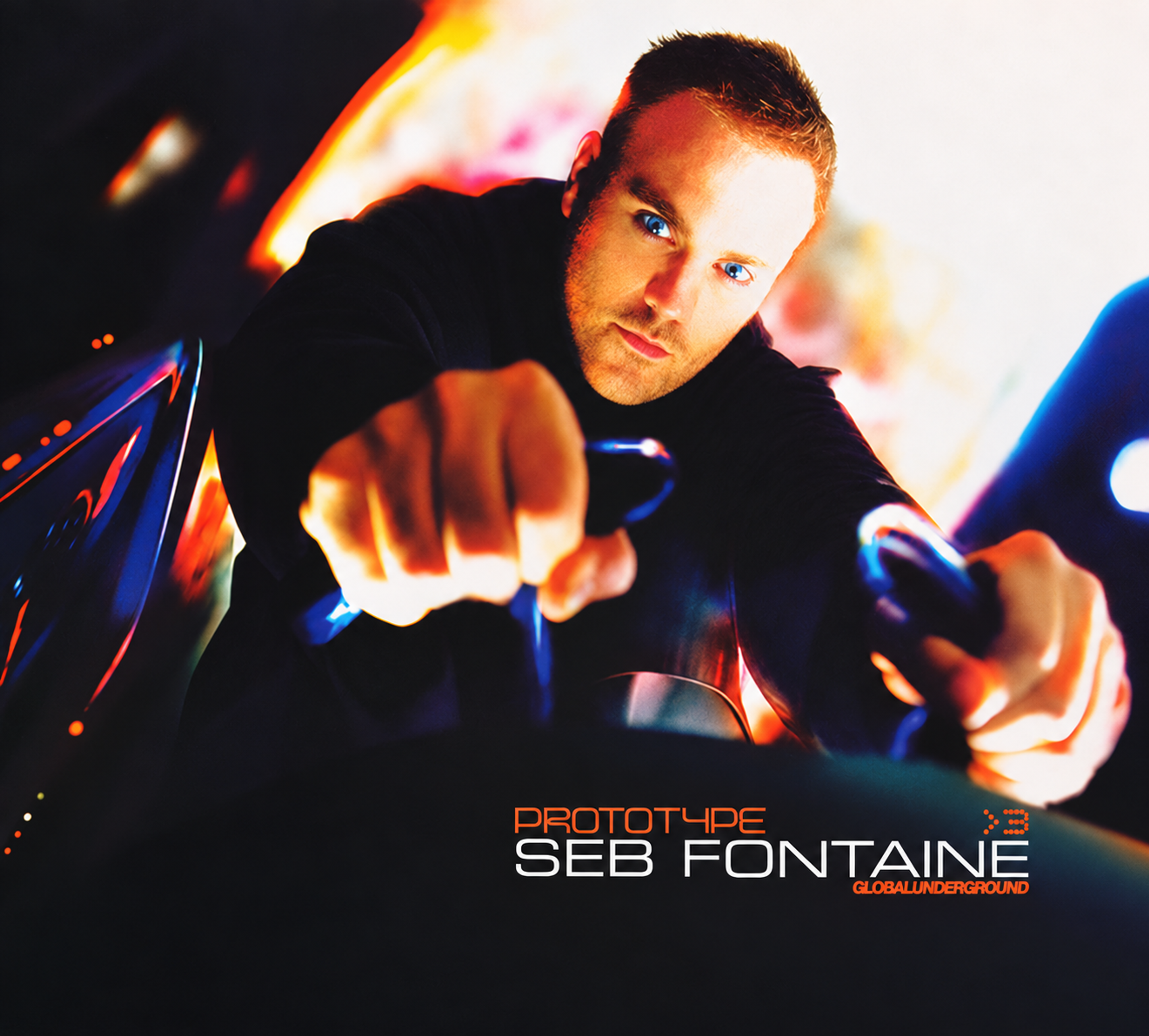 Restored Prototype >3 front cover showing Seb Fontaine leaning forward over equipment, with orange Prototype and Global Underground lettering and white Seb Fontaine text.