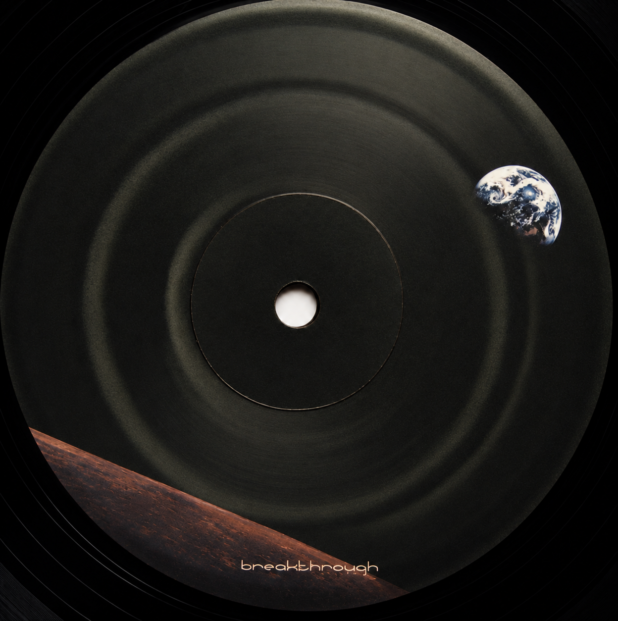 Restored complete Mankind label artwork with Earth, dark concentric rings, a planetary horizon and Breakthrough lettering.