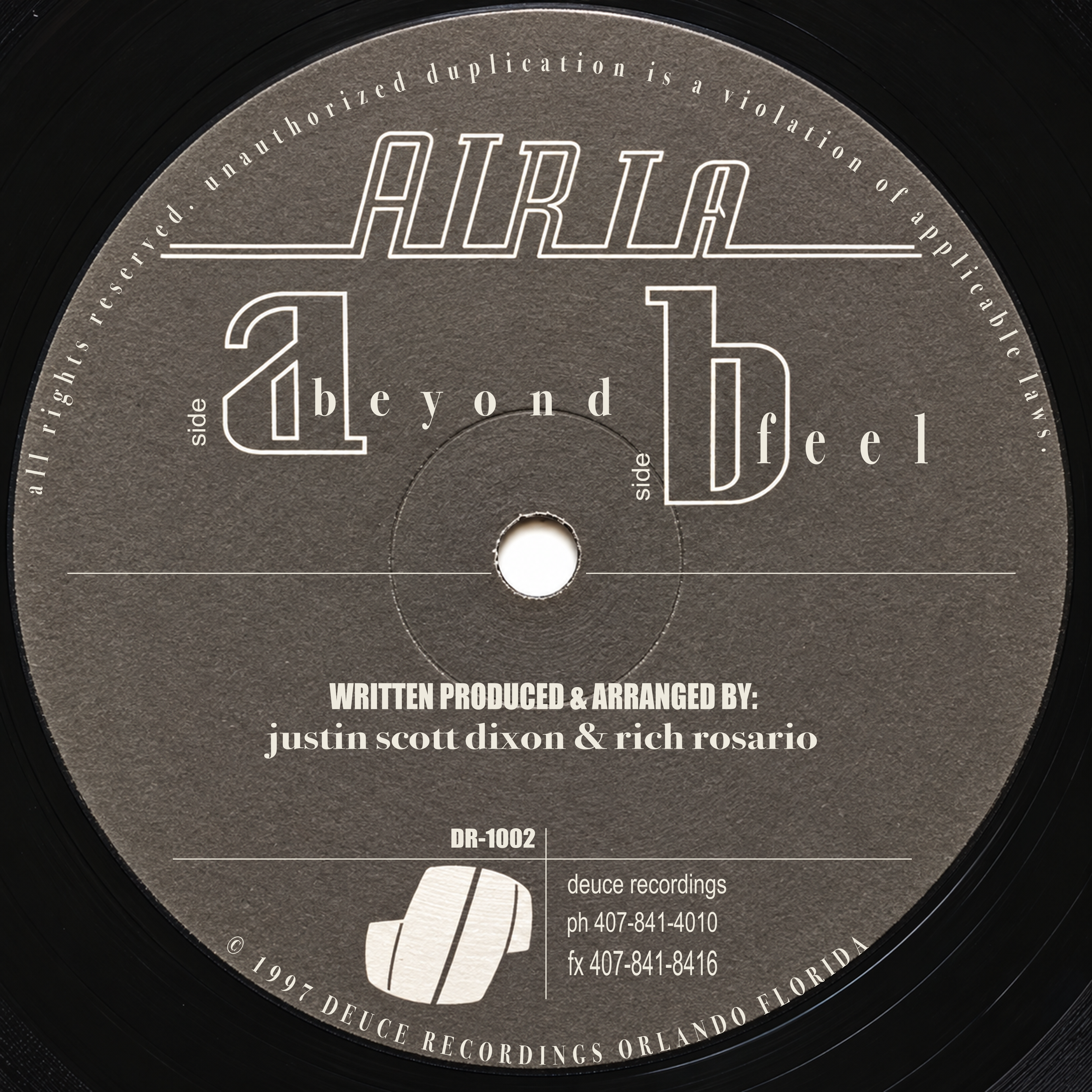 Restored gray circular Deuce Recordings DR-1002 label for Aria — Beyond / Feel, with the outlined AIRIA wordmark, side A and B lettering, and complete credits and rim text.